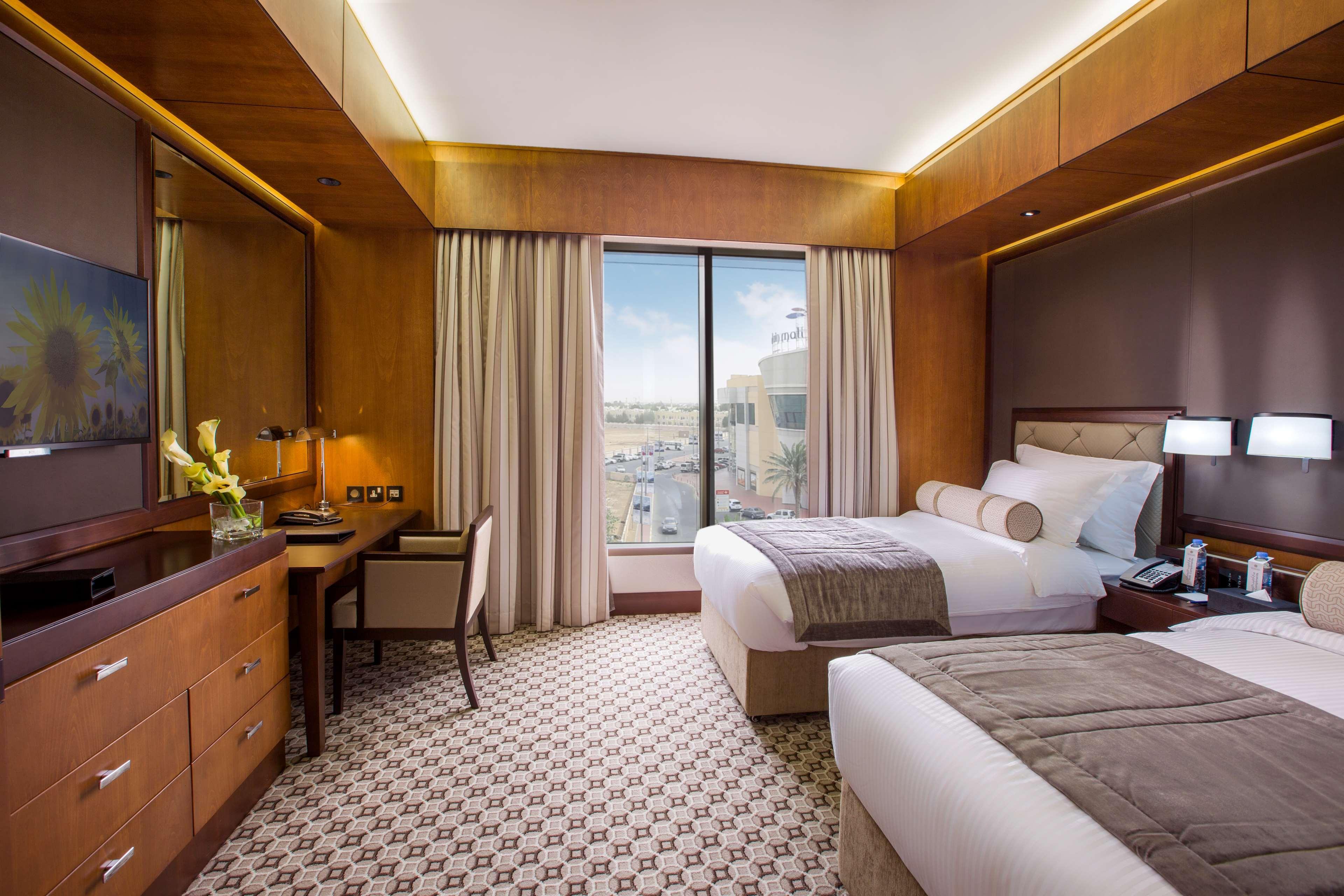 Ayla Grand Hotel Al Ain Eksteriør bilde Deluxe Room